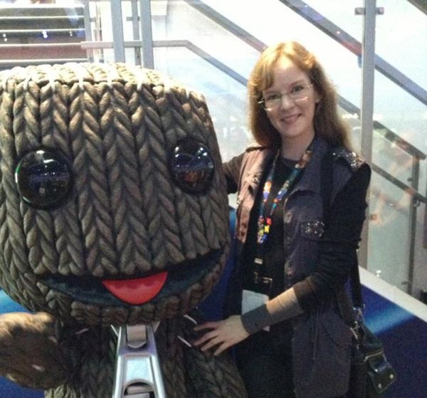 LittleBigPlanet game composer Winifred Phillips in a photo with the game's star, Sackboy.