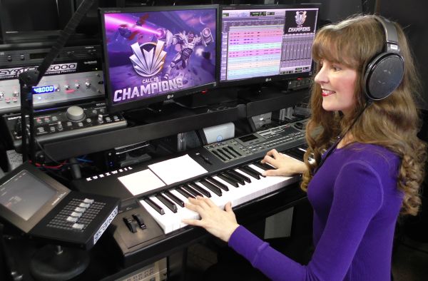 Winifred Phillips, composer of the music for the Call of Champions game, pictured here in her music studio