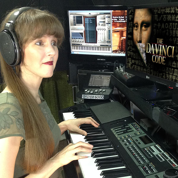 Winifred Phillips - video game music composer - working on the music of The Da Vinci Code video game in her music production studio.