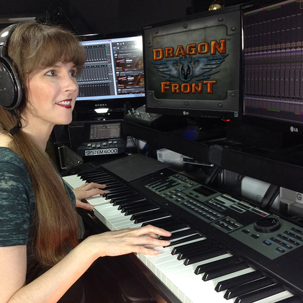 Video game composer Winifred Phillips, pictured in her music production studio working on the music of the Dragon Front virtual reality game for Oculus Rift and Samsung Gear VR.