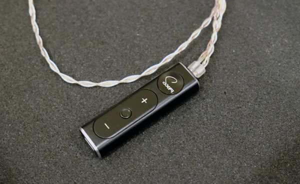 A photo of the SuperX-Fi dongle - in this article for video game composers, Winifred Phillips explores headphone tech appropriate for use in the popular Virtual Reality platform.