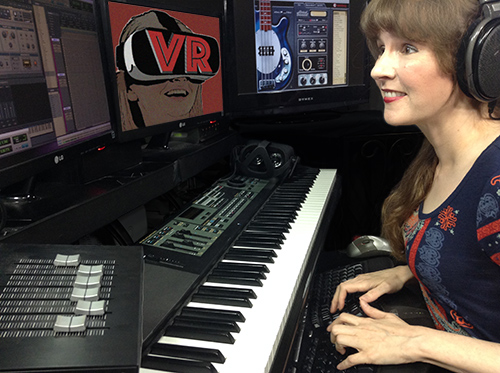 Video game music composer Winifred Phillips working in her video game music production studio, from the article discussing popular Virtual Reality arcades.