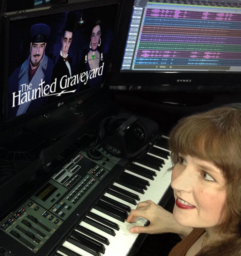 Video game music composer Winifred Phillips in her video game music production studio working on the music of "The Haunted Graveyard" VR game.