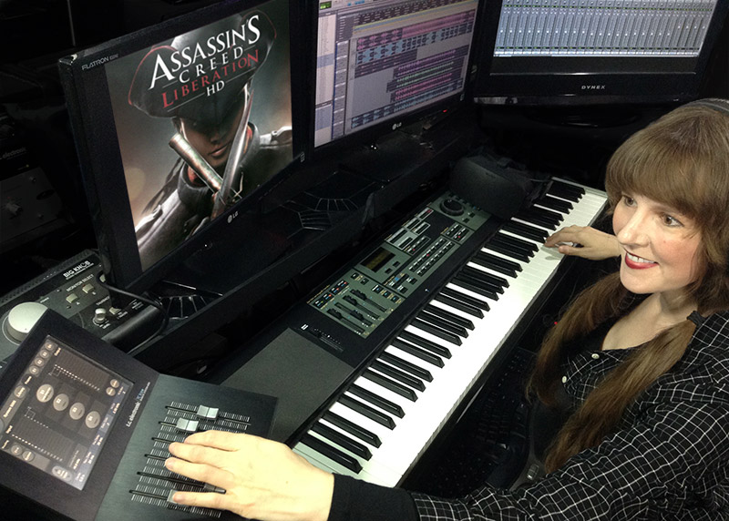 Video game music composer Winifred Phillips creating music in her video game music production studio.