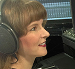 Photo of video game composer Winifred Phillips in her game composers production studio.