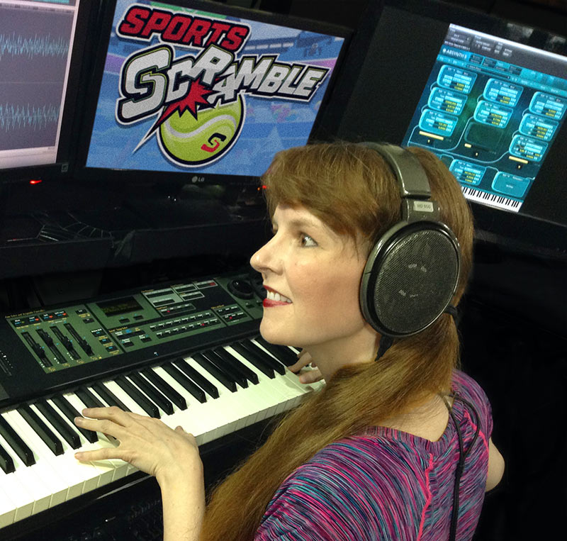 Working on the music of the VR game Sports Scramble, Winifred Phillips is here shown in her professional music production studio.