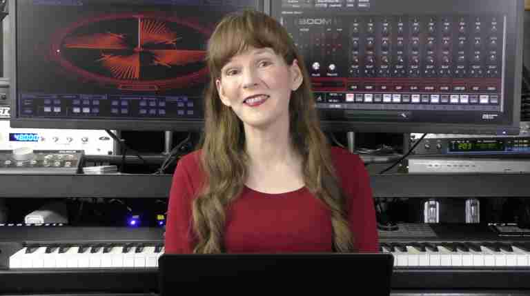 Photo of game music composer WInifred Phillips, pictured in her music production studio at Generations Productions LLC. This photo was taken while Phillips was delivering her presentation for GDC 2020.